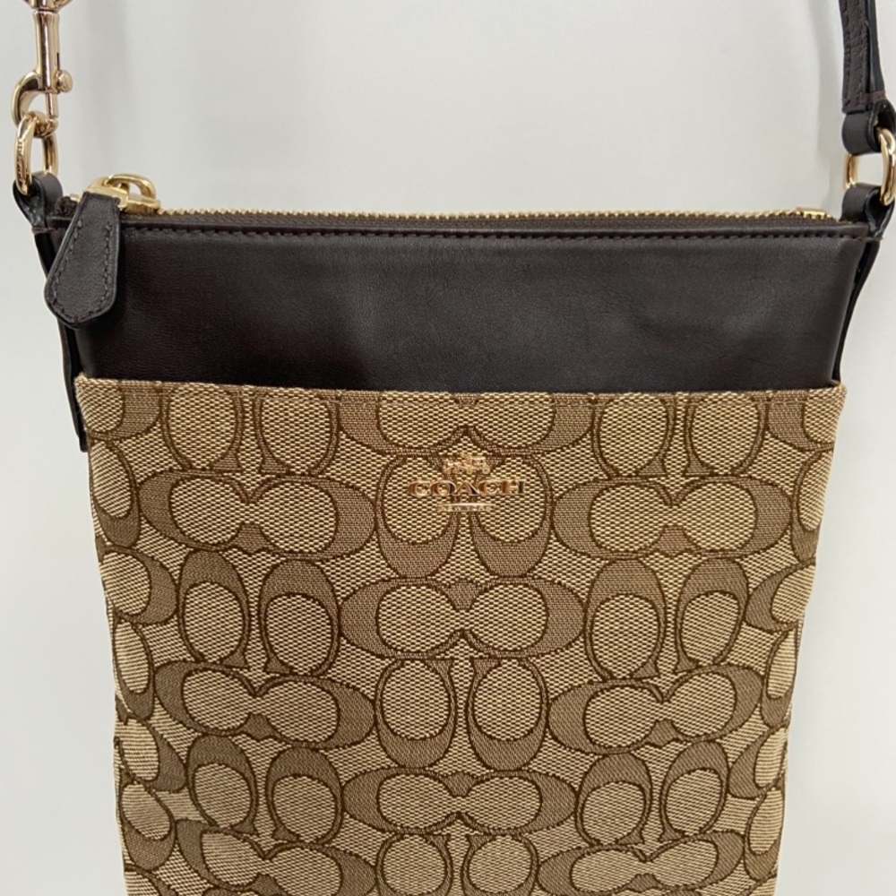 NEW Coach Bag Signature Canvas North South Swing pack 52576‎